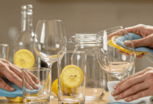 various glass items like wine glasses and jars are shown being cleaned with natural ingredients like lemon and vinegar create in horizontal format do not write text on image