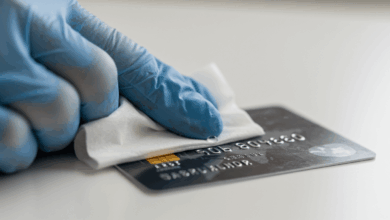 credit card being disinfected with an alcohol wipe create in horizontal format do not write text on image