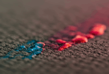 abstract close-up of carpet fibers with a liquid stain being absorbed create in horizontal format do not write text on image
