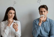 a thoughtful woman looking at her phone wondering why he is not texting back a man looking at his phone with a busy expression a couple communicating face to face showing happiness