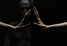 hands setting clear boundaries against a shadowy figure