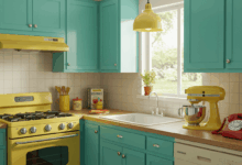 A vibrant retro kitchen featuring turquoise cabinets and mustard yellow appliances