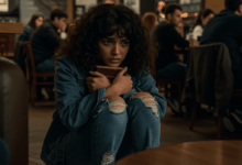 a young person avoiding social interaction and showing signs of distress